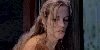[Adrienne with ear to summoning chamber door]