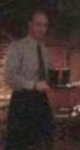[Tom with tray of drinks]