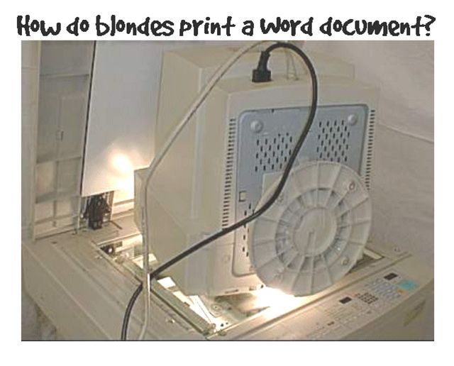 Photo of a computer monitor face down on a photocopier