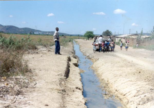 Open effluent channel from industries in Kafue leading to Kaloko stream