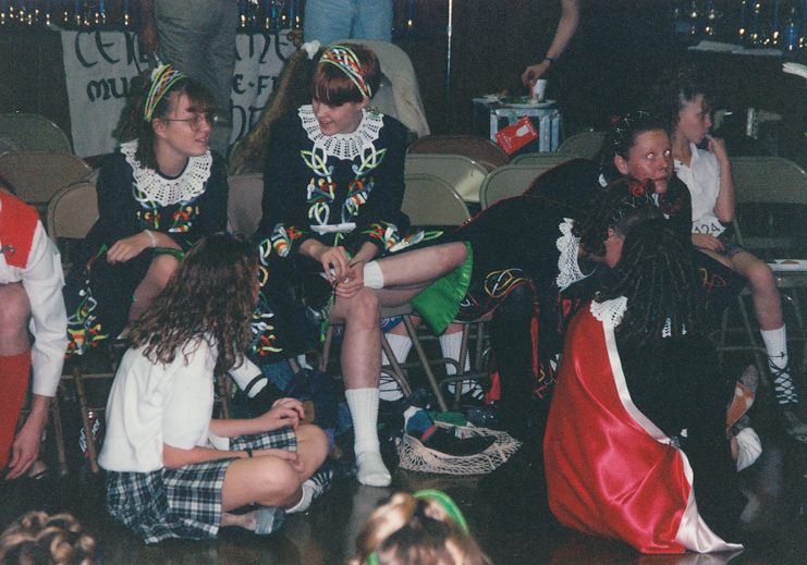 Brandy and me in the midst of a feis. In this photo, there is a nice mix of schools. The ones with large red shawls are McTeggart.