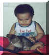 Godson_with_cat3.jpg (77705 bytes)