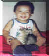 Godson_with_cat.jpg (139944 bytes)