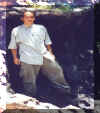 Me_standing_on_rock1.jpg (49729 bytes)