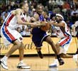 ... while Kobe Bryant tried his best, driving to the hoop as Detroit's Tayshaun Prince and Richard Hamilton defend ...