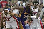 Lakers' Shaquille O'Neal had his hands full with the Wallaces ...