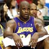 ... as Shaq probably wished Ron Harper (background) were playing instead of his teammates' no-show ...