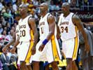 ... as Laker's Gary Payton, Karl Malone and Shaquille O'Neal walks off the court