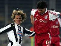 Juventus' Pavel Nedved takes on Bayern Munich's Michael Ballack