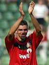 Bayer Leverkusen defender Lucio applauds the fans