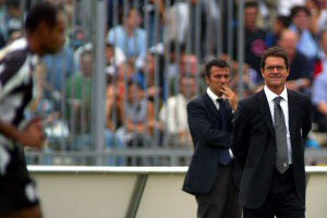 New Juventus coach Fabio Capello watches as Emerson jogs past