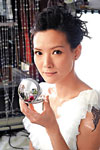 Candy Lo posing in wedding gown