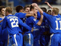 Chelsea celebrate John Terry's goal which puts Chelsea through 5-4 on aggregate