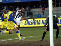 Olivera attempts a half-volley ...