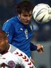 Italy Striker Alberto Gilardino heads the ball