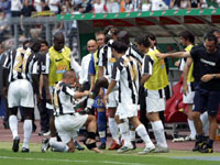 Cannavaro "polishing" Appiah's boot after the Ghanain scored