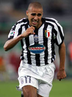 Trezeguet forms a 'c' shape with his fingers