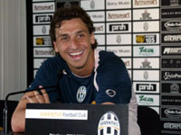 Ibrahimovic smiles during the press conference