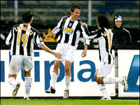 Del Piero celebrates his opening goal with Camoranesi and Zambrotta
