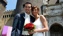Zambrotta and Valentina posing in front of the Church where they were married