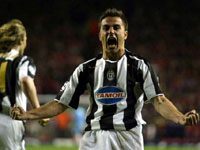 Cannavaro lets out his joy as the ball goes in