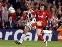 Luis Garcia scores an excellent volley as Emerson watches