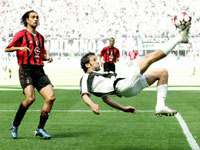 Del Piero executes an over-head kick as Nesta watches ..
