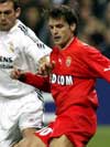 Monaco's Morientes being hounded by Real Madrid's Bravo