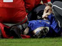 Juventus' Pavel Nedved being attended to by medics