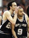 Ginobilli kisses Parker's head