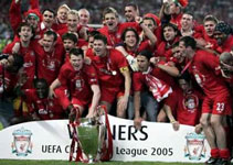 Liverpool players pose with the Champions' League Trophy