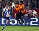 Porto's Dmitri Alenichev shoots past Monaco goalkeeper Flavio Roma