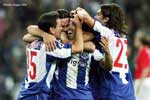 Porto's Deco congratulated by teammates after scoring to give Porto a 2-0 lead