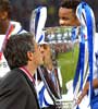Porto's manager Jose Mourinho kisses the UEFA Champions League trophy