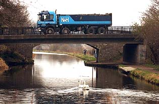 A lorry crosses the Union Canal in Edinburgh. The road haulage lobby doubts whether investing money in the canal network will make much difference to road use. Picture: David Moir