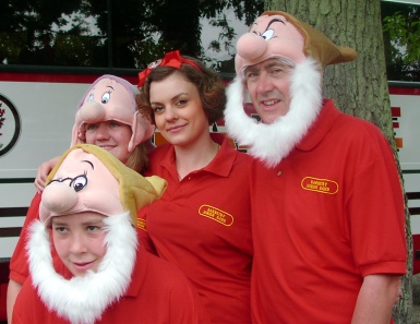 Photograph of the Junior Band players with comic hats