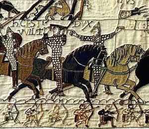William showing his face and Eustace holding the Papal banner rally their troops