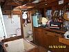 Interior of Midship deckhouse with hatch to the engine room.
