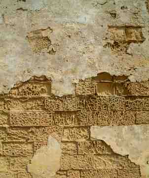 Another crumbling wall