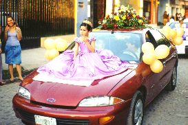 Girl on car in the parade