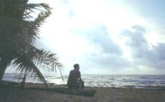 Gord sitting on the beach