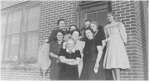 Burr Oak ladies in front of barber shop