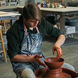 Throwing a bowl on the potter's wheel