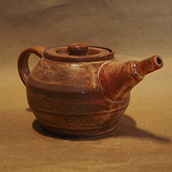 rustic yellow teapot