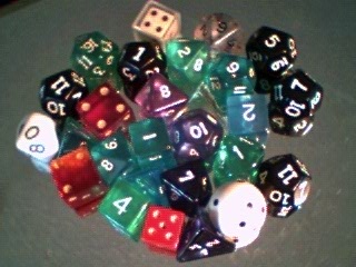 Assorted dice, in the retired pile