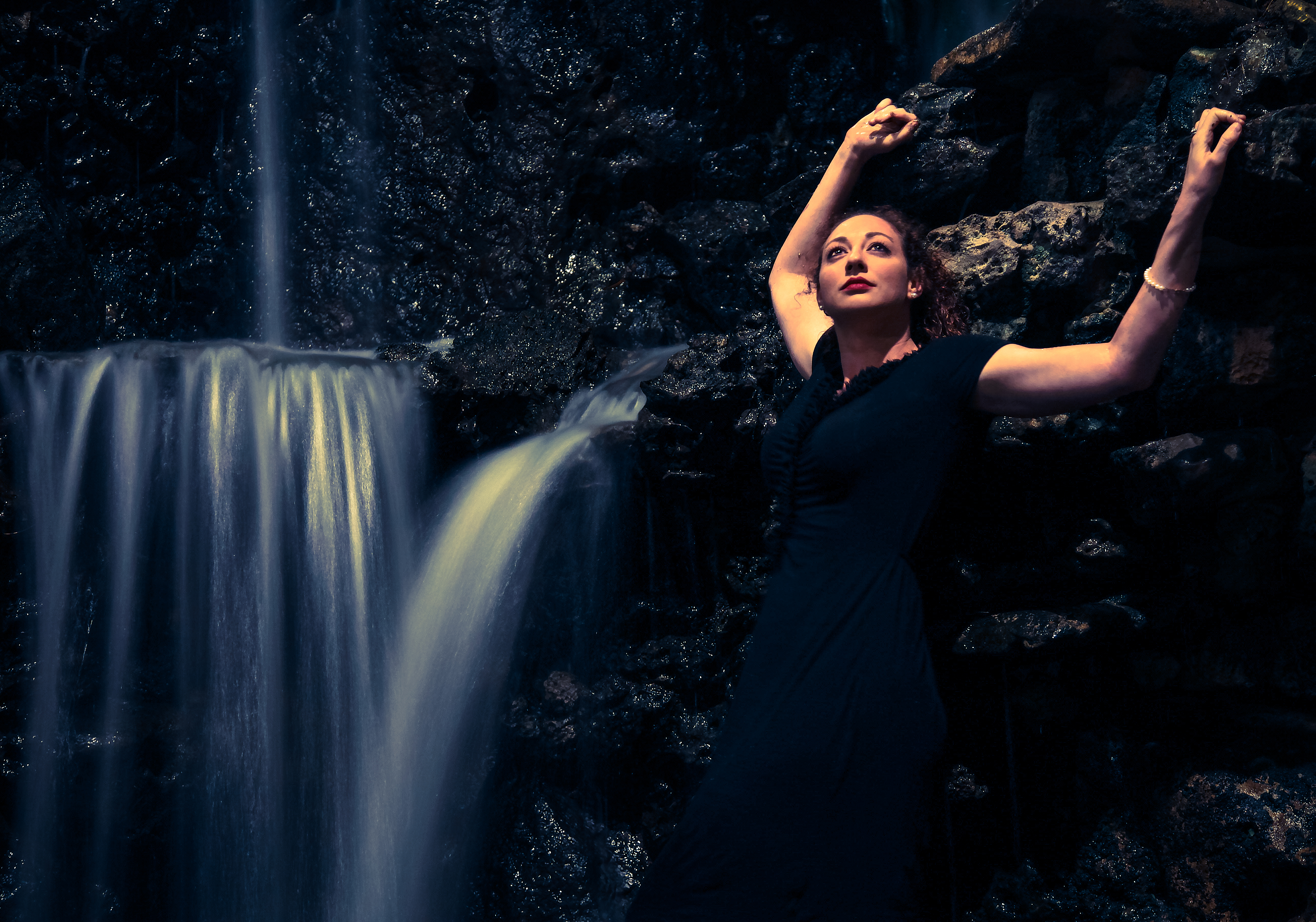 Laura in a waterfall
