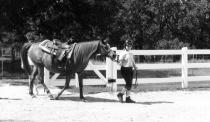 Emma leading her horse