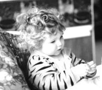 Maggie in her High Chair
