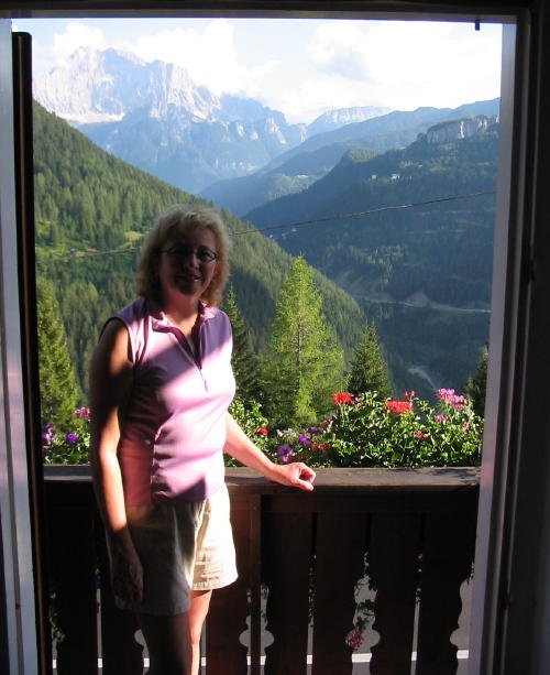 A million dollar view of the Italian Dolomites right from your bedroom window