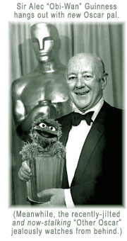 Sir Alec ''Obi-Wan'' Guinness hangs out with new Oscar pal. (Meanwhile, the recently-jilted and now-stalking ''Other Oscar'' jealously watches from behind.)